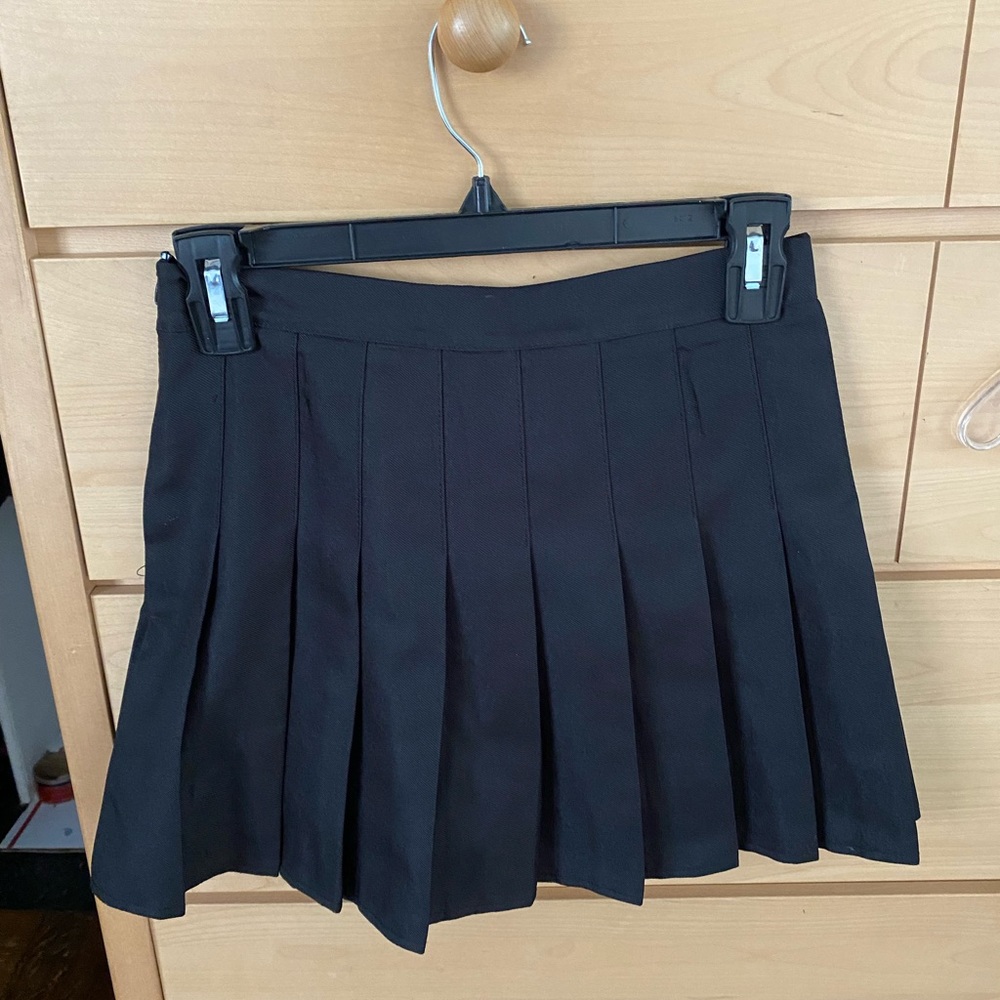 black pleated tennis mini skirt